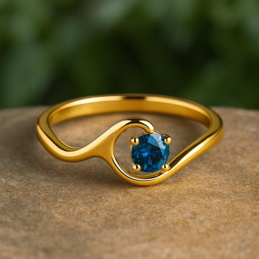 Sterling Silver London Blue Topaz Wave Ring: Modern Ocean Jewelry
