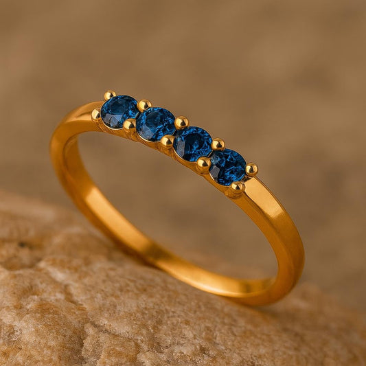 Sterling Silver London Blue Topaz Ring: Dainty Four Stone Band