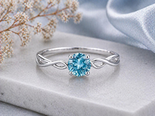 Swiss Blue Topaz Ring, 925 Sterling Silver, Infinity Twist Band, Round Cut Solitaire