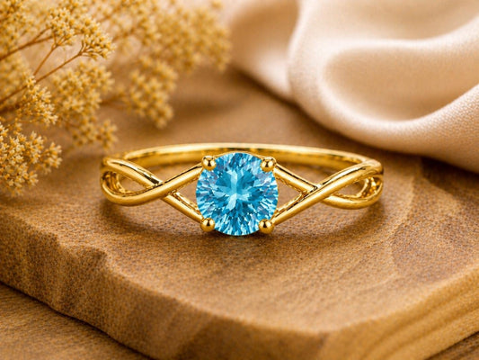 Swiss Blue Topaz Ring, Sterling Silver Infinity Twist Solitaire, Round Cut Gemstone
