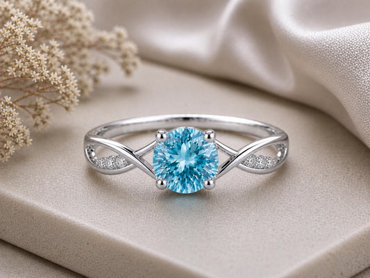 Swiss Blue Topaz Infinity Ring, Sterling Silver Solitaire with CZ Accents