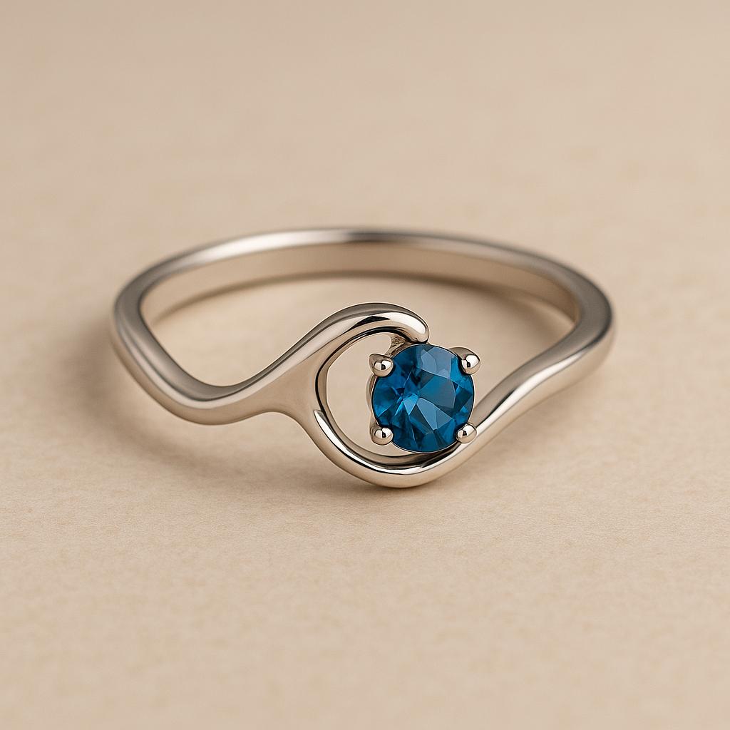 Sterling Silver London Blue Topaz Wave Ring: Modern Ocean Jewelry