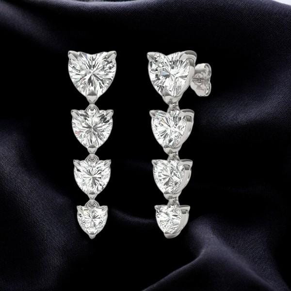 Sterling Silver Heart CZ Dangle Earrings: Romantic Statement Jewelry