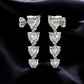 Sterling Silver Heart CZ Dangle Earrings: Romantic Statement Jewelry