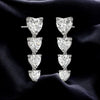 Sterling Silver Heart CZ Dangle Earrings: Romantic Statement Jewelry