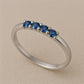 Sterling Silver London Blue Topaz Ring: Dainty Four Stone Band