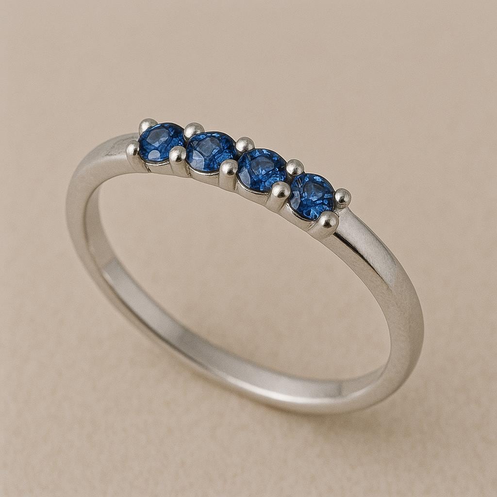 Sterling Silver London Blue Topaz Ring: Dainty Four Stone Band