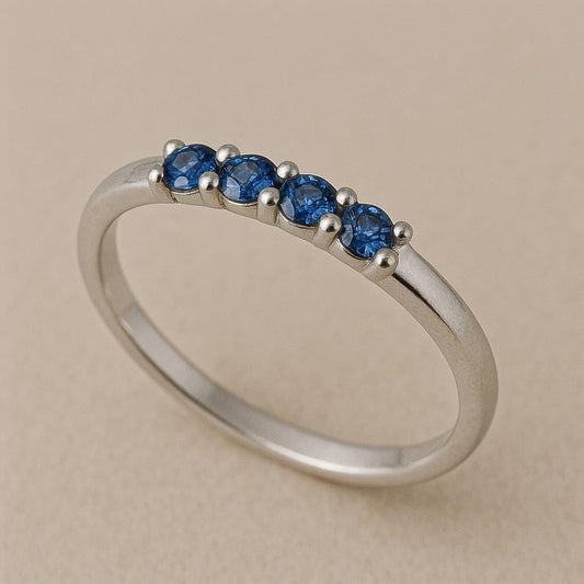 Sterling Silver London Blue Topaz Ring: Dainty Four Stone Band