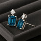 London Topaz Emerald Cut Stud Earrings: 925 Sterling Silver & CZ