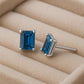 Emerald Cut London Topaz Stud Earrings: Sterling Silver December Birthstone