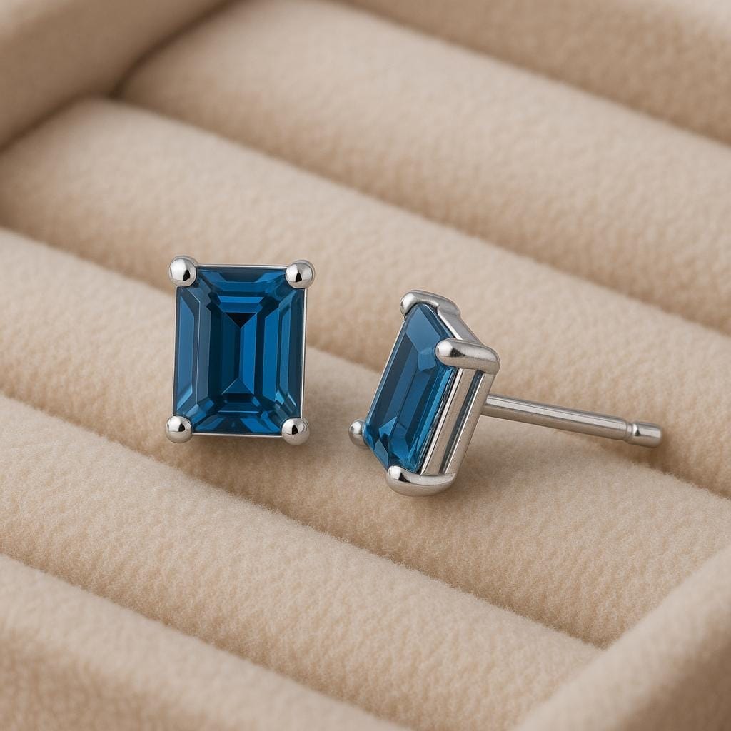 Emerald Cut London Topaz Stud Earrings: Sterling Silver December Birthstone