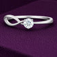 Infinity CZ Ring 925 Silver | Twist Solitaire | Promise Ring | Minimal Diamond Look
