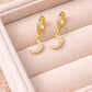 Sterling Silver CZ Moon Huggie Earrings – Celestial Dangle Hoops
