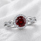 Sterling Silver Garnet Halo Ring, January Birthstone, Infinity Twist Band, CZ Accents