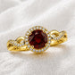 Sterling Silver Garnet Halo Ring, January Birthstone, Infinity Twist Band, CZ Accents