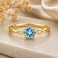 Swiss Blue Topaz Ring, 925 Sterling Silver, Infinity Twist Band, Round Cut Solitaire