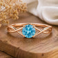 Swiss Blue Topaz Ring, Sterling Silver Infinity Twist Solitaire, Round Cut Gemstone