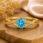 Swiss Blue Topaz Ring, Sterling Silver Infinity Twist Solitaire, Round Cut Gemstone