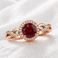Sterling Silver Garnet Halo Ring, January Birthstone, Infinity Twist Band, CZ Accents