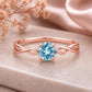 Swiss Blue Topaz Ring, 925 Sterling Silver, Infinity Twist Band, Round Cut Solitaire