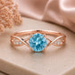 Swiss Blue Topaz Infinity Ring, Sterling Silver Solitaire with CZ Accents