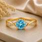 Swiss Blue Topaz Infinity Ring, Sterling Silver Solitaire with CZ Accents